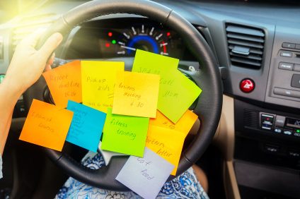 74007339 - to do list in a car - busy day concept